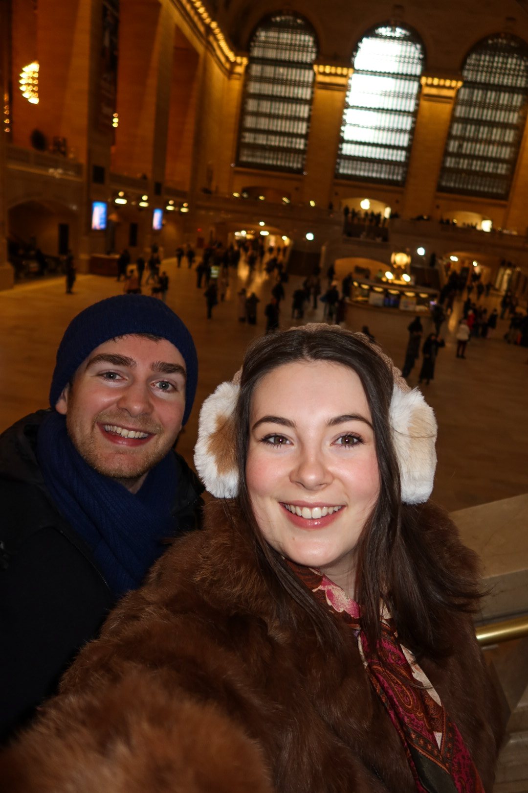 Ellie and Sam smiling in Grand Central Terminal
